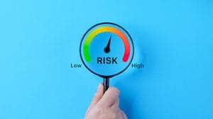 Decorative image of risks through a magnifying glass
